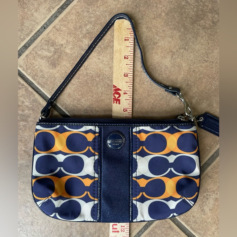 Coach navy/gold wristlet purse bag